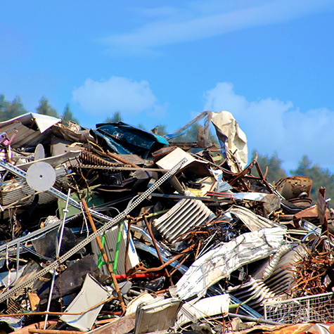 Recycling scrap metal pile outdoors